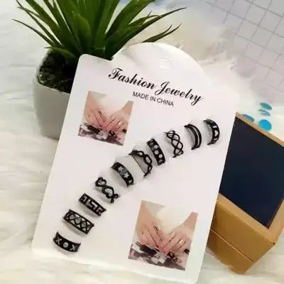10-Piece Adjustable Ring Set - Open Back Rings on Female Model Hand
