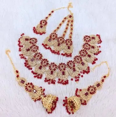 Bridal Artificial Stones Bridal Set - Close-up of Hand-Set Faux Rubies and Pearls