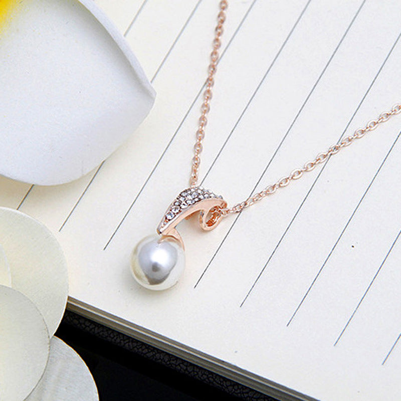 Bridal Rose Gold Pearl Pendant and Earrings Set for weddings