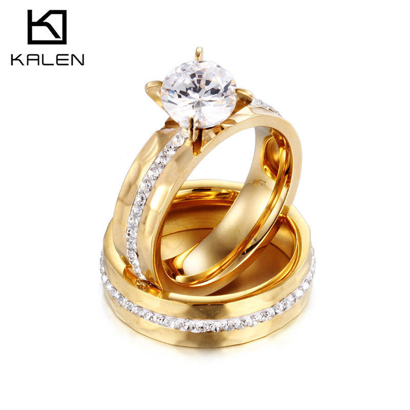 Gold Titanium Steel Couple Rings - Close-up of Women Single Diamond Stone Setting