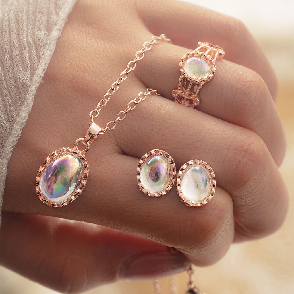Rose Gold Gemstone Jewelry Set - Close-up of Intricate Cushion Cut Stone Prong Setting